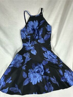 Avery G Aline formal cocktail dress with Bold Blue Floral Print and Halter Neck